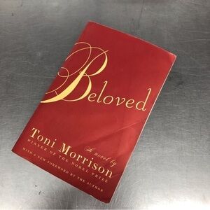 Beloved by: Toni Morrison, paperback book